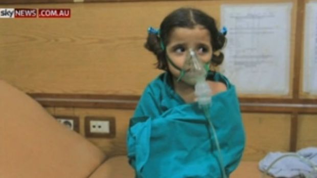 A young girl suffering the effects of a suspected gas attack in Aleppo this week