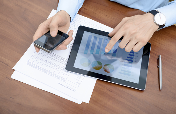 Man working with modern devices