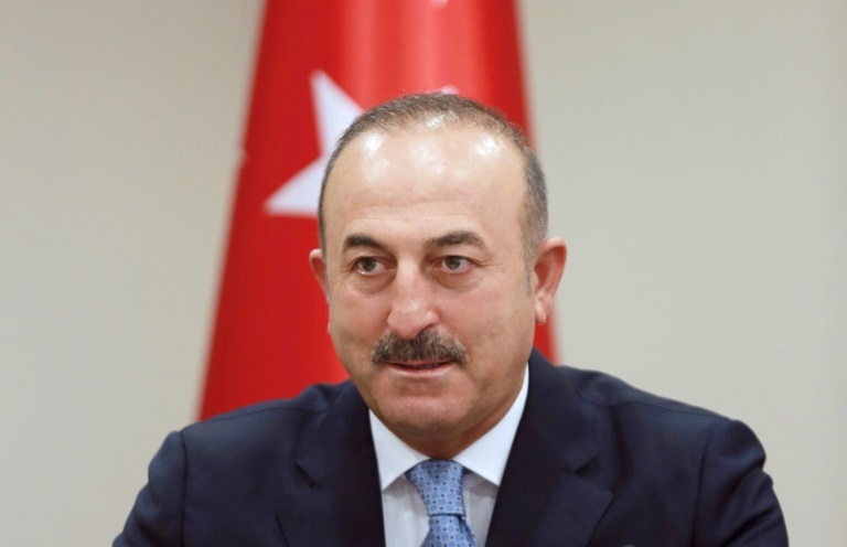 AFP  Adem Altan
Turkey’s Foreign Minister Mevlut Cavusoglu speaks with members of the media in Ankara