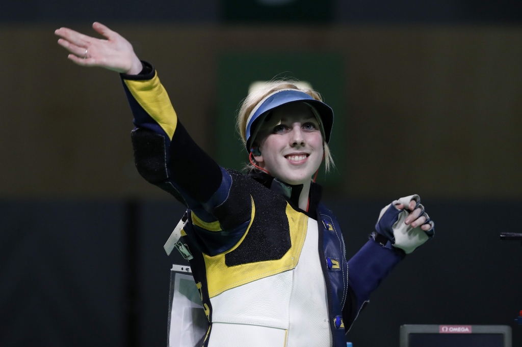 Thrasher celebrates after winning the gold medal in the women’s 10-meter air rifle event Saturday