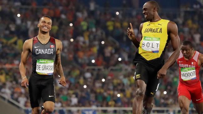 APUsain Bolt and Andre De Grasse