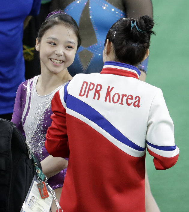 ASSOCIATED PRESS
South Korea's Lee Eun-ju left talks with North Korea's Hong Un Jong during the artistic gymnastics women's qualification