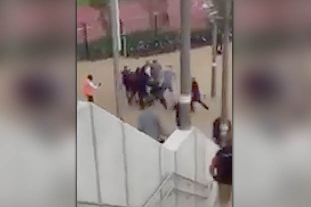 AWAYDAYS    
     SCRAP A passer-by captured violent scenes following West Ham's win over Bournemouth yesterday