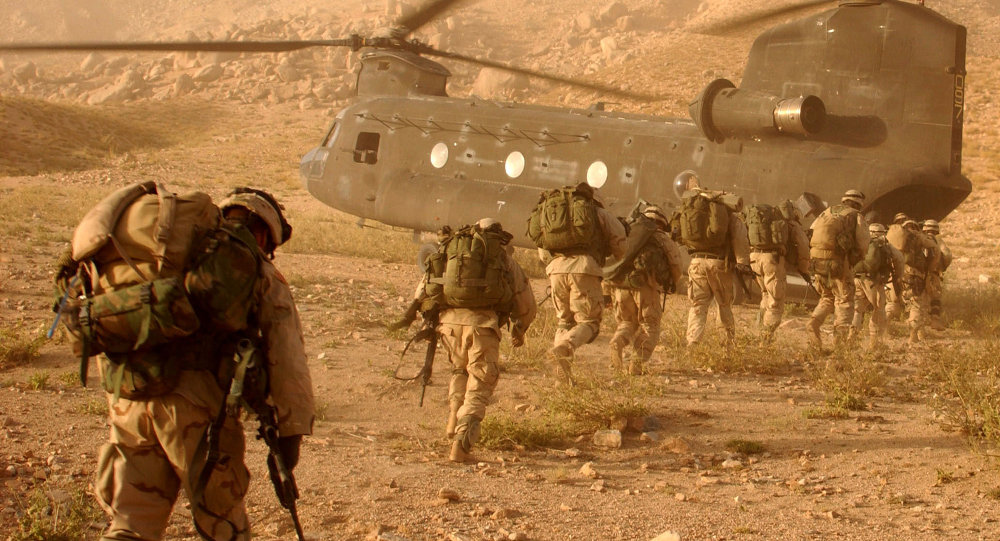 US troops board a helicopter in Afghanistan