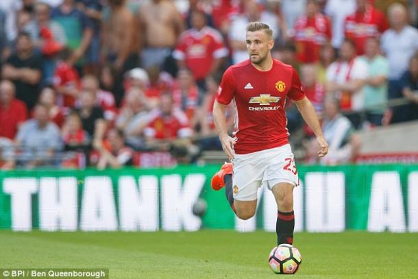 Above Luke Shaw in action during Manchester United's 2-1 win over Leicester City