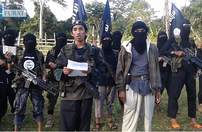 Abu Sayyaf militants marching in Philippines