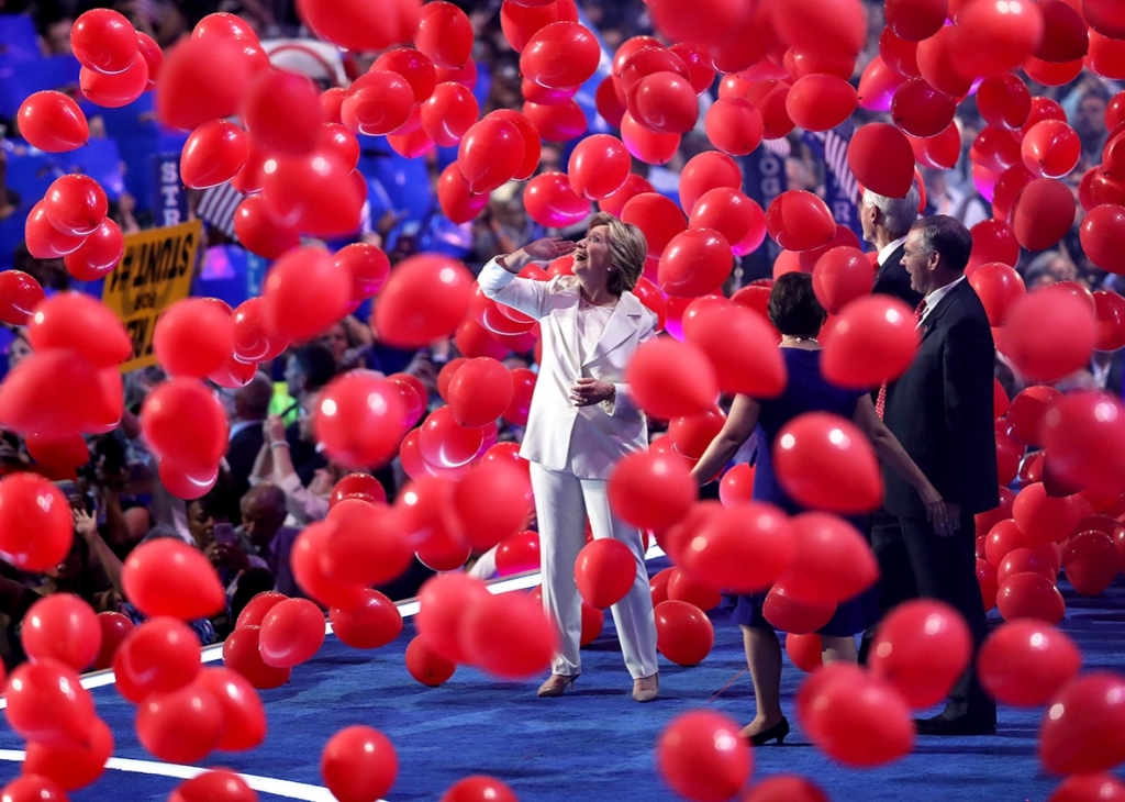 Democratic presidential candidate Hillary Clinton watches balloons drop at the end of the fourth day of the Democratic National Convention at the Wells Fargo Center