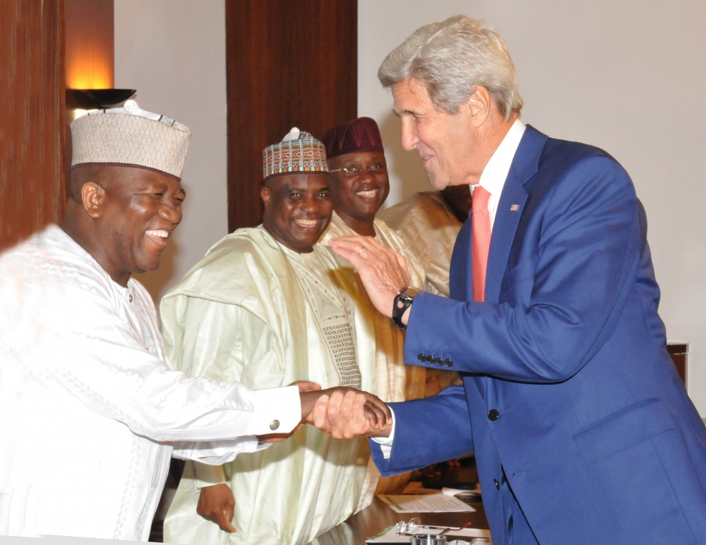 PIC. 33. FROM LEFT GOVERNORS ABDULAZIZ YARI OF ZAMFARA AMINU TAMBWAL OF SOKOTO AND MOHAMMED JIBRILLA OF ADAMAWA STATE WELCOMING THE VISITING U. S. SECRETARY OF STATE MR JOHN KERRY TO A MEETING WITH NORTHERN STATE GOVERNORS AT THE PRESIDENTIAL VILLA I