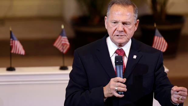 Alabama Supreme Court Chief Justice Roy Moore speaks to the congregation of Kimberly Church of God Sunday