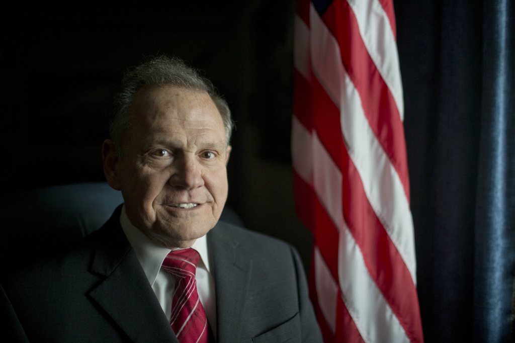 Feb. 17 2015 Alabama Chief Justice Roy Moore poses in front the the American flag in Montgomery Ala. The chief justice continues to fight against gay marriage in Alabama. Moore told state probate judges to refuse the