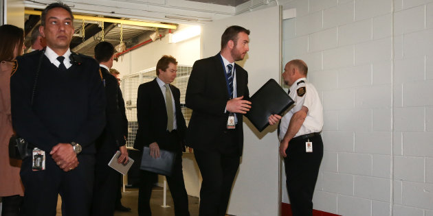 Alex Ellinghausen Fairfax                    AFP officers in the basement of Parliament House in Canberra