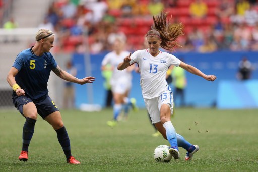 Alex Gordon dribbles around a Swedish defender during the US loss