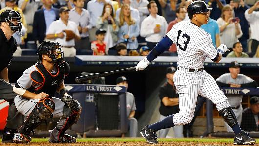 New York Yankees’ Alex Rodriguez flies out to end the sixth inning in a game against the Miami Marlins at Yankee Stadium in New York