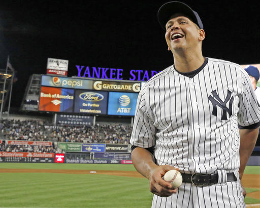 New York Yankees&#039 Alex Rodriguez holds a baseball as he laughs during an interview following his final baseball game as a Yankee player against the Tampa Bay Rays at Yankee Stadium in New York Friday Aug. 12 2016. The Yankees won 6-3.(AP