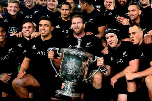 New Zealand's captain Kieran Read holds the Bledisloe cup during the rugby Test match between New Zealand and Australia at Westpac Stadium in Wellington