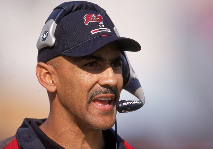 Tony Dungy of the Tampa Bay Buccaneers watches the action against the Dallas Cowboys at the Raymond James Stadium