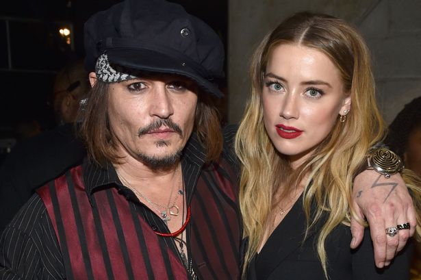 Johnny Depp agrees to pay Amber Heard $7 million as they settle bitter divorce battle