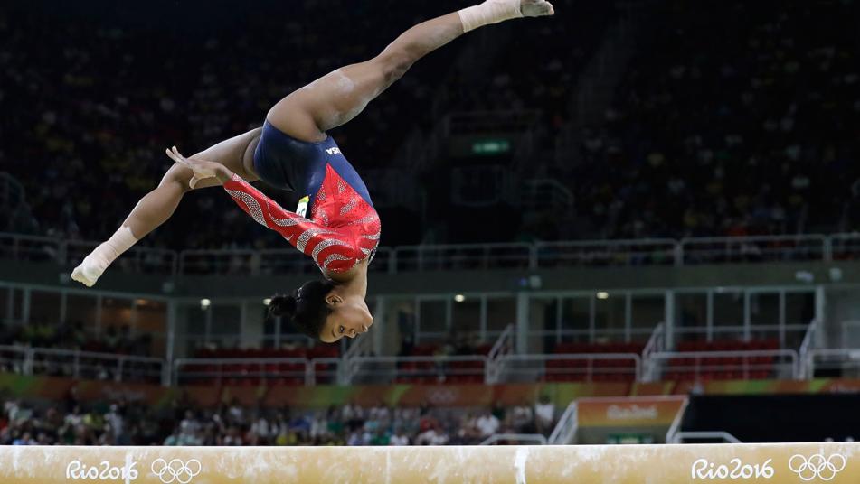 Gabby Douglas on balance beam in qualifications at Rio Olympics