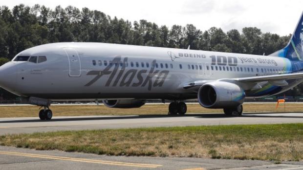 An Alaska Airlines jet lands in Seattle this past summer. Reuters file