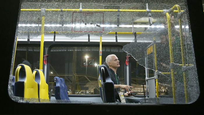 An unidentified person sits in on a bus whose window has been shattered in Rio de Janeiro Brazil.        
      Credit Shannon Stapleton  Reuters