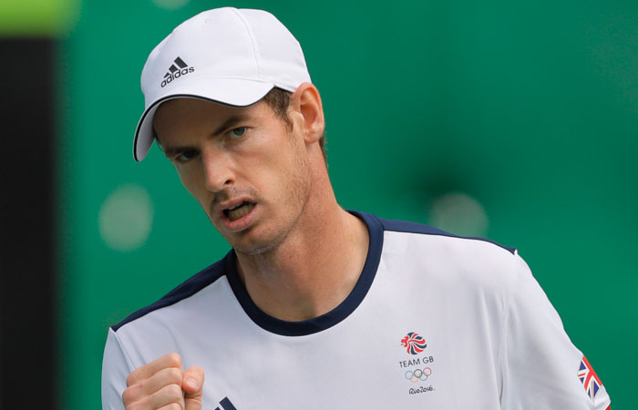 Great Britain's Andy Murray reacts after winning a point against Steve Johnson of the United States during the men's tennis competition at the 2016 Olympics in Rio Friday. — AP