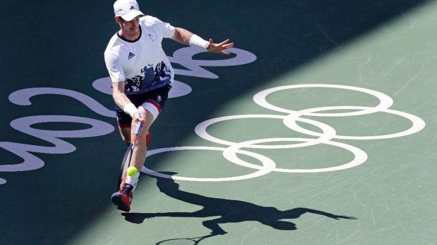 Andy Murray of England returns to Kei Nishikori of Japan during their semi-final round match at the 2016 Summer Olympics in Rio de Janeiro Brazil Saturday Aug. 13 2016