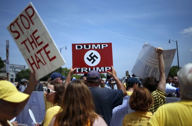 Anti-Trump protesters begin their march to cross a bridge near the Republican National Convention in Cleveland Ohio US