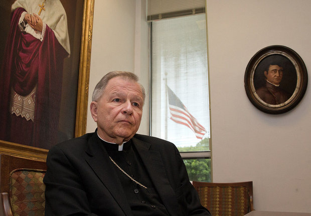 Archbishop of New Orleans Gregory Aymond in his office