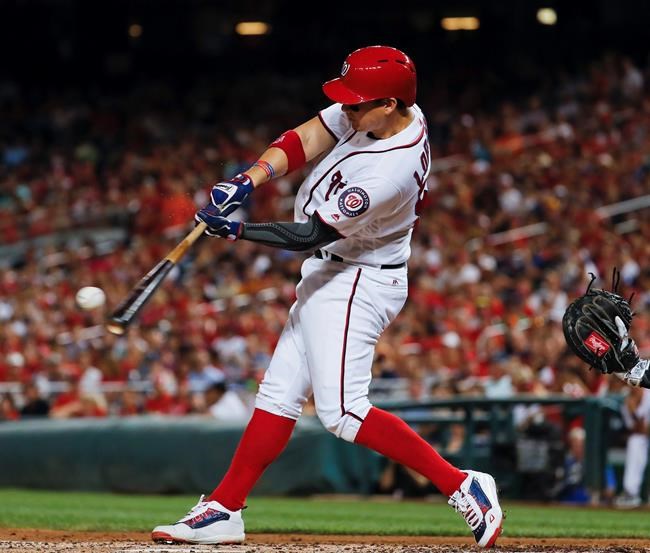 Washington Nationals Jose Lobaton grounds into a double play but scores teammate Anthony Rendon to take the lead during the fourth inning of a baseball game against the Colorado Rockies at Nationals Park Friday Aug. 26 2016 in Washington. (AP