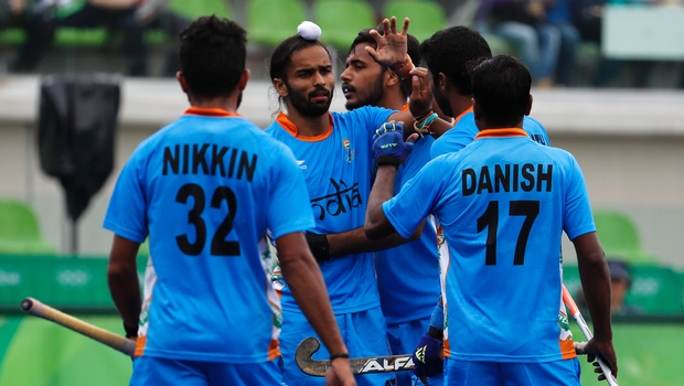 India's Akashdeep Singh center celebrates after scoring against Canada during a men's field hockey match at the 2016 Summer Olympics in Rio de Janeiro Brazil Friday Aug. 12 2016. | AP