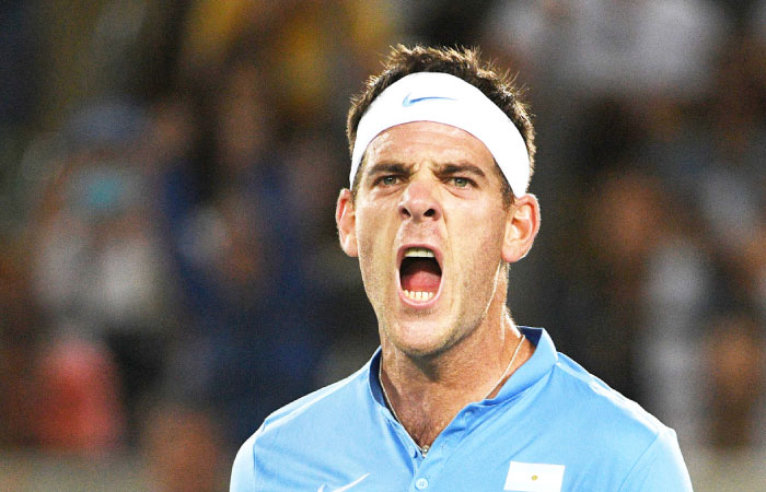 Argentina’s Juan Martin del Potro celebrates after beating Serbia’s Novak Djokovic at the Olympic Tennis Tournament in Rio de Janeiro Sunday. — AFP