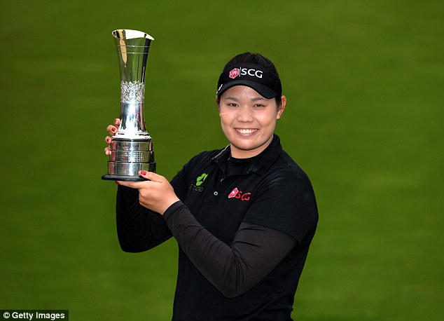 Ariya Jutanugarn of Thailand poses with the trophy after winning the Ricoh Women's British Open