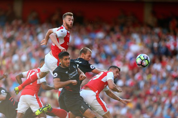 LONDON ENGLAND- AUGUST 14 Calum Chambers of Arsenal scores a goal to make it 3-4 during the Premier League match between Arsenal and Liverpool at Emirates Stadium