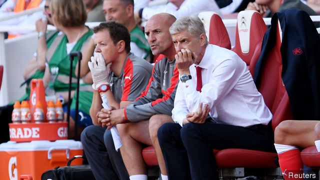 Arsenal manager Arsene Wenger looks dejected