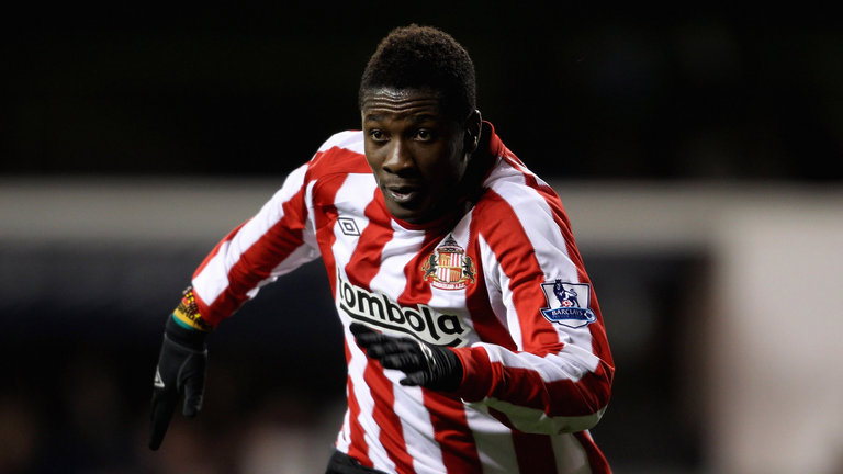 Asamoah Gyan arrives in England amid Sunderland and Fulham interest