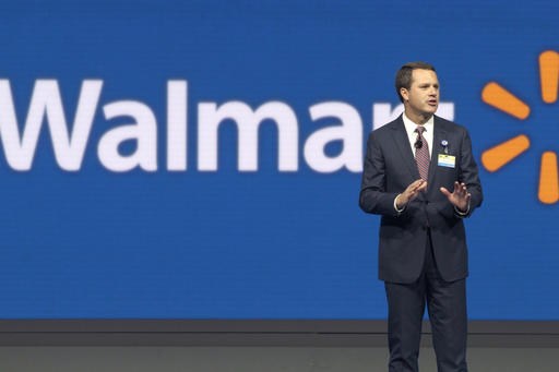 Wal Mart CEO Doug Mc Millon speaks at the company's shareholder meeting in Fayetteville Ark. Wal Mart reports financial results Thursday Aug. 18 2016