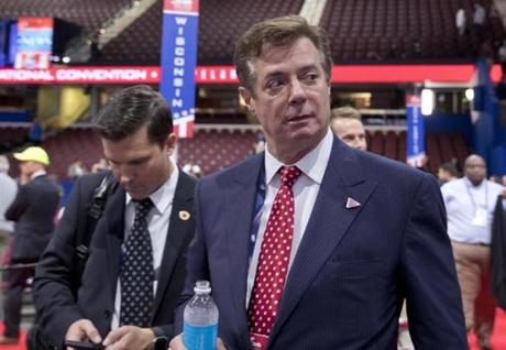 Trump campaign chairman Paul Manafort walks around the convention floor before the opening session of the Republican National Convention in Cleveland. Hillary Clintonâ€™s campaign is questioning Donald