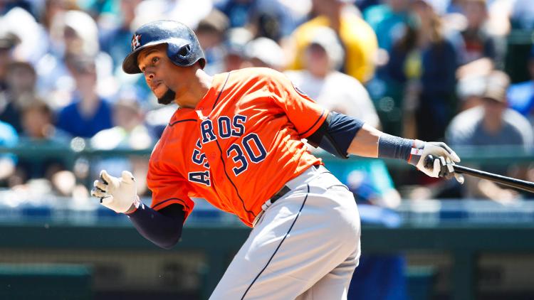 Houston Astros center fielder Carlos Gomez gets on base via a fielding error by the Seattle Mariners during the second inning at Safeco Field. Houston defeated Seattle 8-1