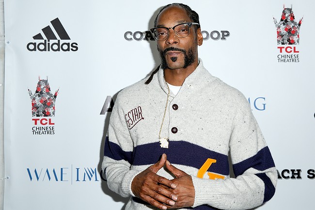 Up to 15 injured after fence collapses at Snoop Dogg concert in New Jersey