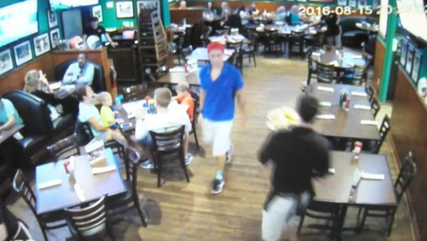 Austin Harrouff seen in surveillance footage at a Florida restaurant Monday Aug. 15 2016         
                                     WPEC