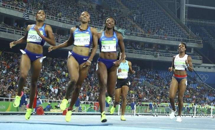 2016 Rio Olympics- Athletics- Final- Women's 100m Hurdles Final- Olympic Stadium- Rio de Janeiro Brazil- 17/08/2016. Tiffany Porter of Britain watches gold medallist Brianna Rollins of USA, silver medallist Nia Ali