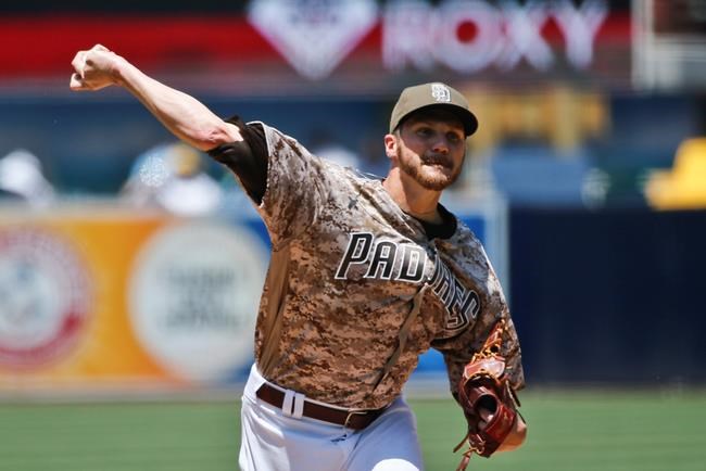 San Diego Padres starter Paul Clemens throws against the Cincinnati Reds in the first inning of a baseball game Sunday