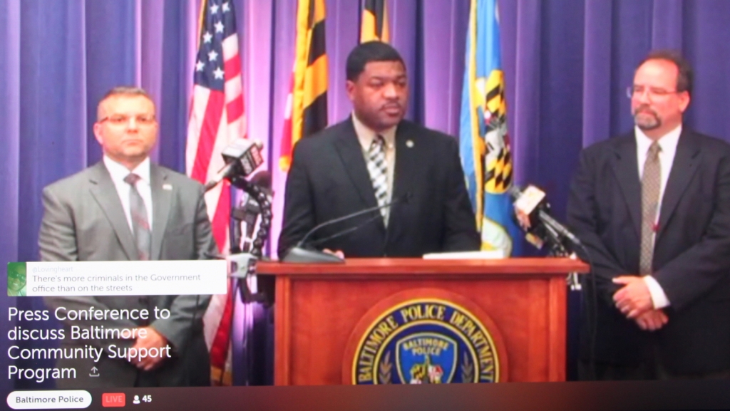 Baltimore Police Department spokesman T.J. Smith answers media questions about aerial surveillance program