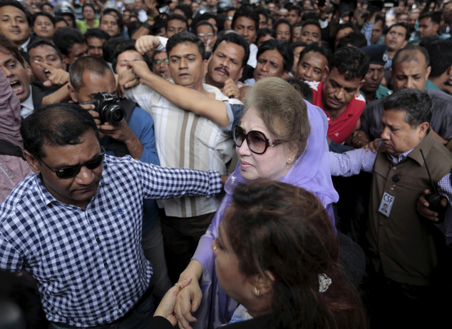 Former Bangladeshi Prime Minister and Bangladesh Nationalist Party leader Khaleda Zia center arrives for a court hearing in Dhaka Bangladesh Wednesday A