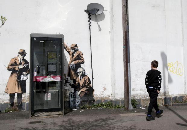 Banksy Spy Booth mural famously depicting 'snooping' near government listening post GCHQ in Cheltenham is removed