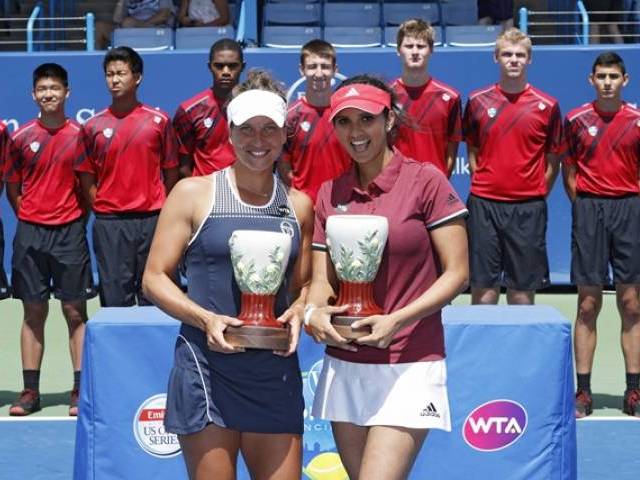 Barbora Strycova and Sania Mirza celebrate their win