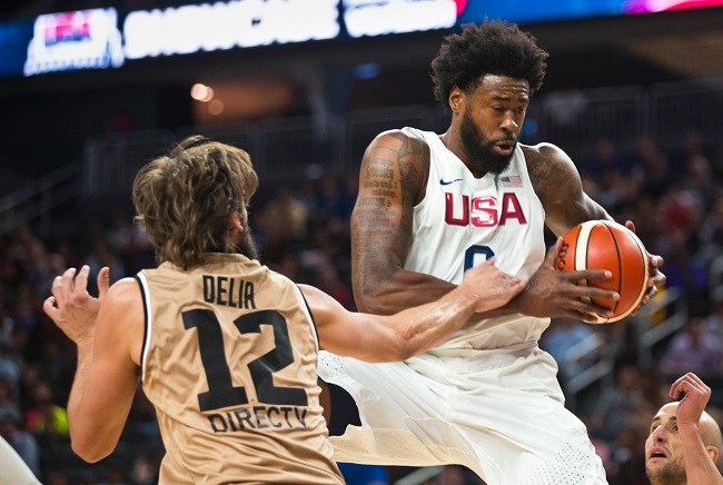 Argentina center Marcus Nicolas Delia fouls United States center De Andre Jordan during the first half of their warm-up international exhibition game Friday