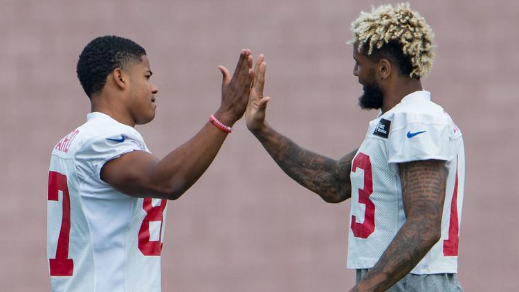 New York Giants wide receiver Odell Beckham high fives New York Giants wide receiver Sterling Shepard at Quest Diagnostics Training Center