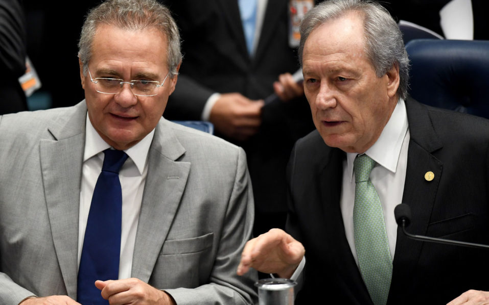 Brazilian Supreme Court's President Ricardo Levandowski talks with Senate's President Renan Calheiros during the Senate impeachment trial of Brazilian President Dilma Rousseff at the National Congress in Brasilia