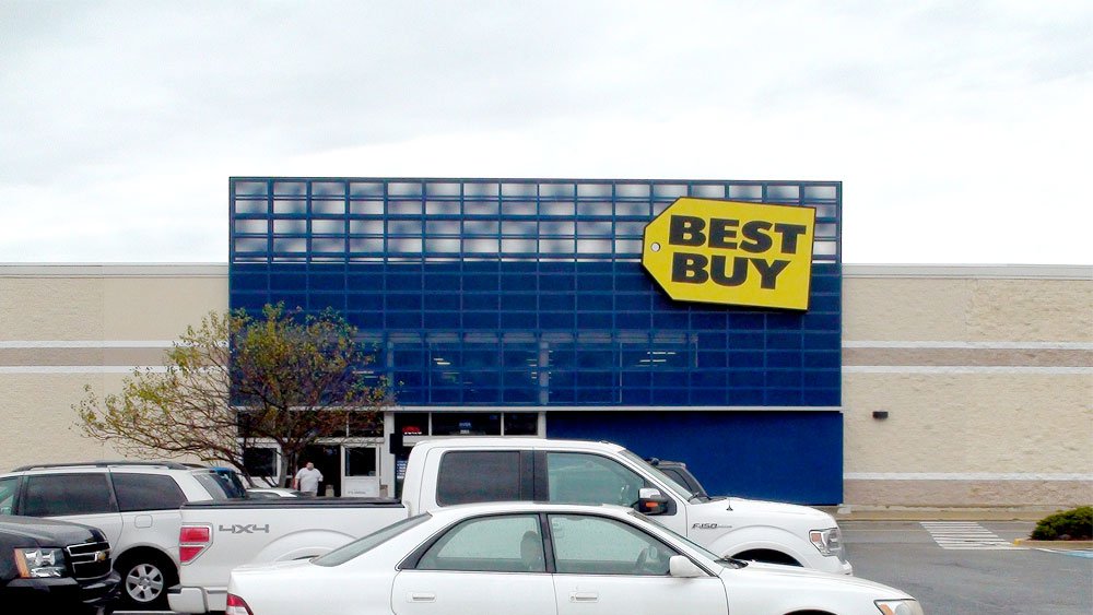 Best Buy management has been cutting costs closing underperforming stores and selling foreign divisions to boost profits